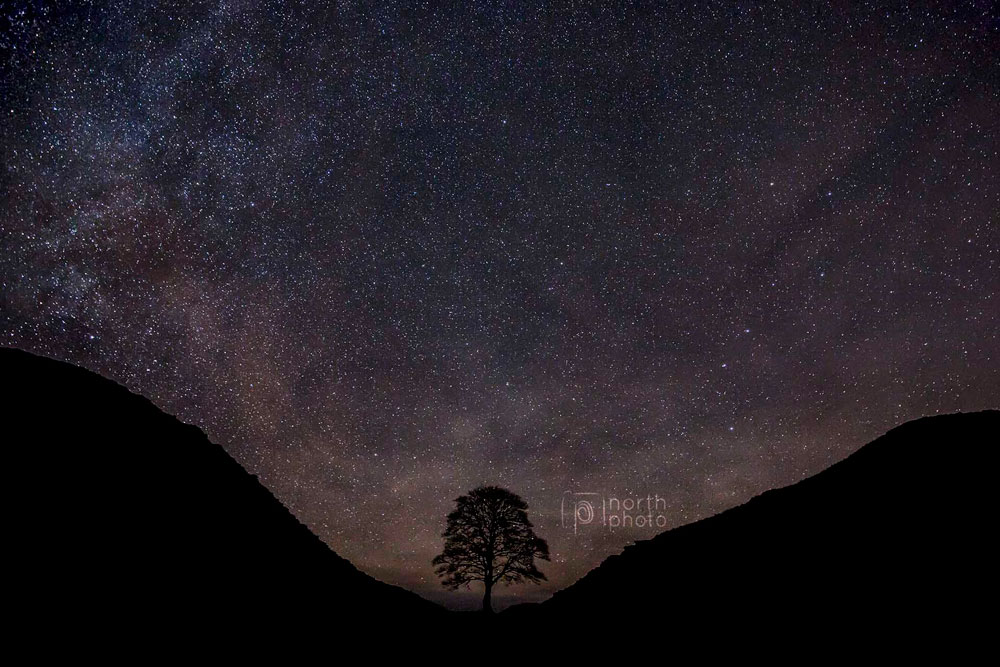 Sycamore Gap under the stars, including the Milky Way and Ursa Major