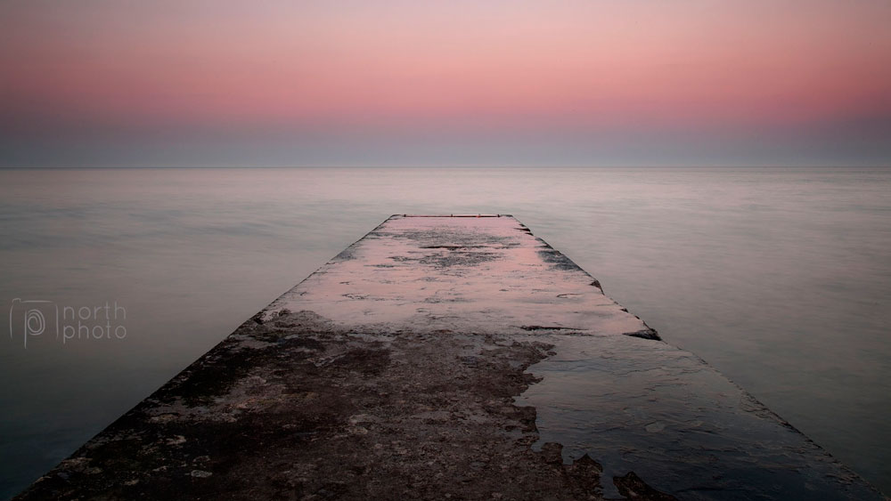 The jetty on Byth South Beach at sunset