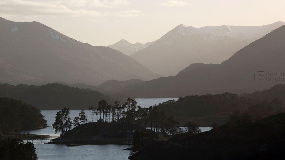 Loch Affric at sunset, with the layers of the Kintail Mountains